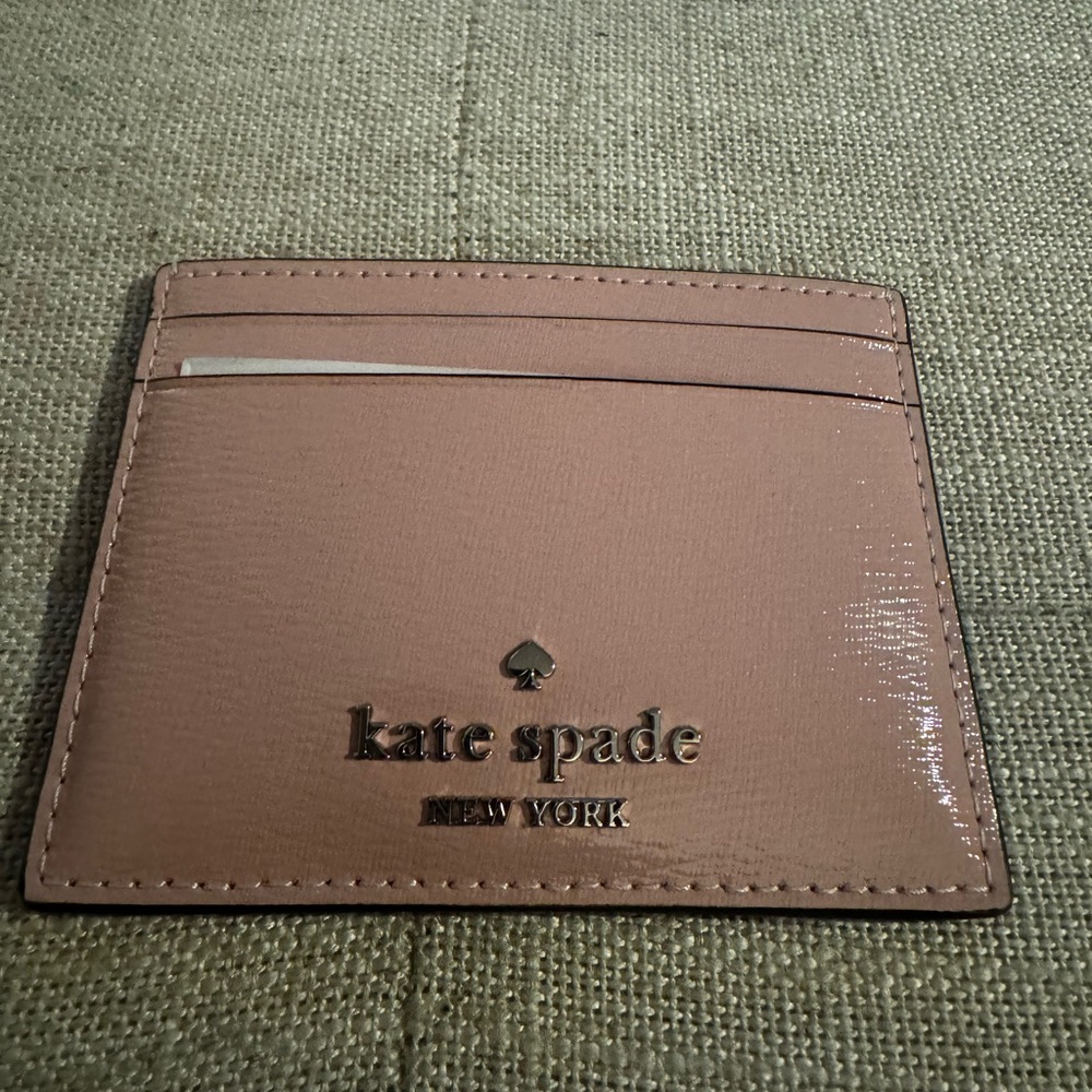 Kate Spade blush pink leather card case with gold logo. NWT
